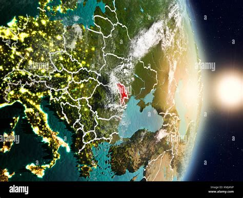 Moldova during sunrise highlighted in red on planet Earth with visible ...