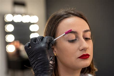 Beautiful Young Girl In A Beauty Salon Where She Is Modeled Into The