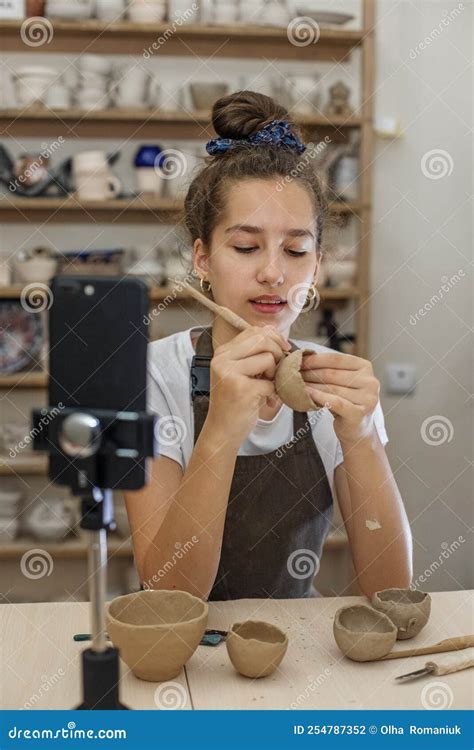 Beautiful Teenage Girl Playing With Modeling Clay In Pottery Workshop Craft And Clay Art