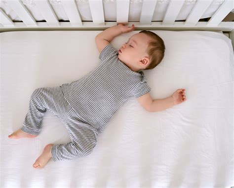 Baby Sleeping On Bed