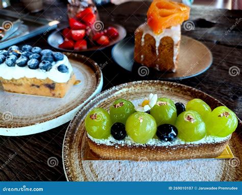 Several Kinds Of Fruit Cake On The Table Focused On Shine Muscat Grape