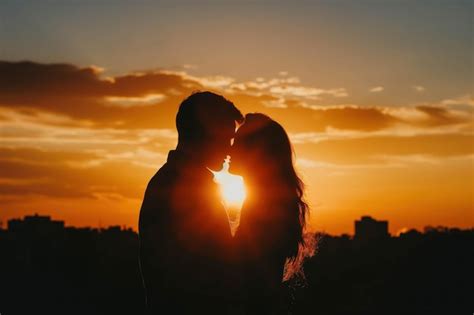 Premium Photo Silhouette Of A Young Couple In Love Face To Face On