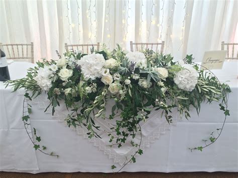 White Long Low Floral Wedding Table Arrangement