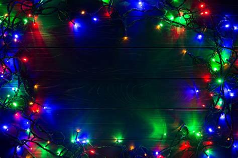 Premium Photo | Christmas background with lights and free text space. christmas lights. glowing ...