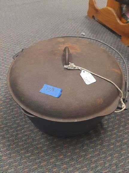 Huge Cast Iron Dutch Oven With Lid The Auction Team