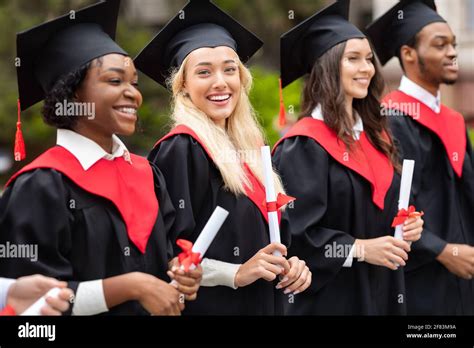 Pretty Blonde Lady Standing Among International Group Of Students Stock Photo Alamy