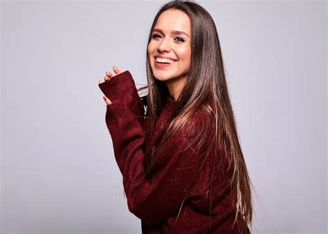 Free Photo Portrait Of Beautiful Happy Cute Brunette Woman Model In Casual Warm Red Sweater