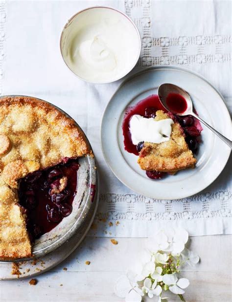 A Piece Of Pie On A Plate Next To A Bowl Of Yogurt