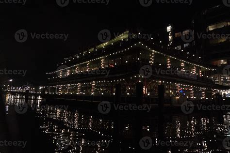 amsterdam canal at night view floating restaurant 20233698 Stock Photo ...