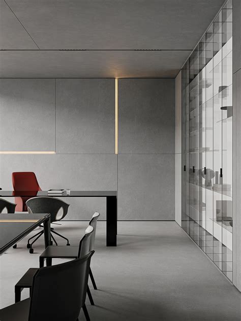 An Empty Conference Room With Red Chairs And A Black Table In Front Of