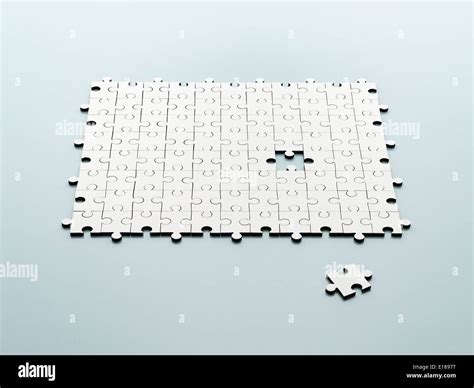 Completing Jigsaw Puzzle Hi Res Stock Photography And Images Alamy