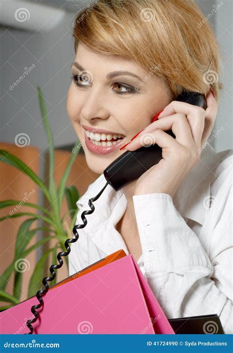 Office Lady With Folders Making A Phone Call Stock Photo Image Of