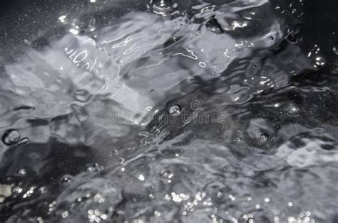 Surface of Intensive Boiling Water with Bubbles and Swirls Stock Image ...