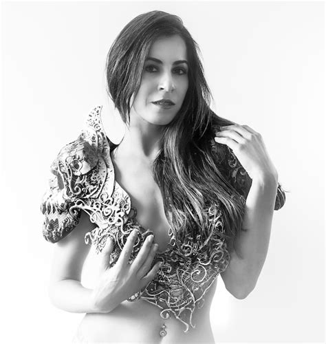 Premium Photo Armor And Power Beautiful Nude Brunette Woman With Long Dark Hair On White Wall