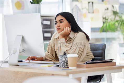 A Bored Lazy And Tired Employee Working On A Computer In The Office