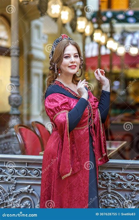 A Dark Haired Tudor Woman In A Red Dress Stock Image Image Of Female