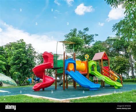 Colorful Playground On Yard In The Park Playground For Kids On Trees