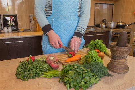 Young Male Cooking Healthy Meal in the Kitchen. Cooking Healthy Food at ...