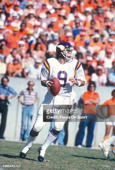 Tommy Kramer of the Minnesota Vikings sets up to pass against the ...