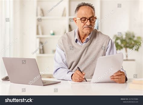 Mature Man Sitting Front Laptop Computer Stock Photo Shutterstock