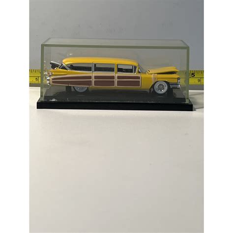 Hot Wheels Collectibles 1959 Cadillac Eldorado Woodie die-cast car. It