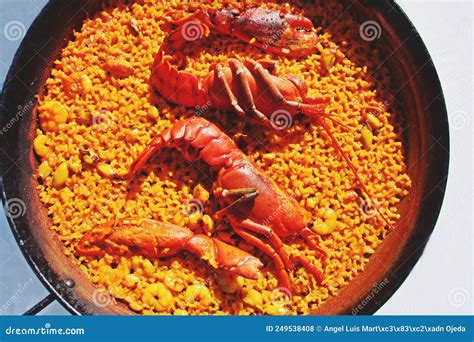 European Lobster Paella Served In A Restaurant In Valencia Spain