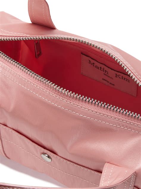 Glossy Logo Sporty Mini Duffel Bag In Light Pink Matin Kim