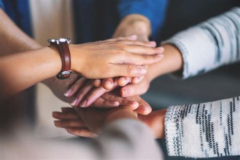 Premium Photo Cropped Image Of Business People Stacking Hands