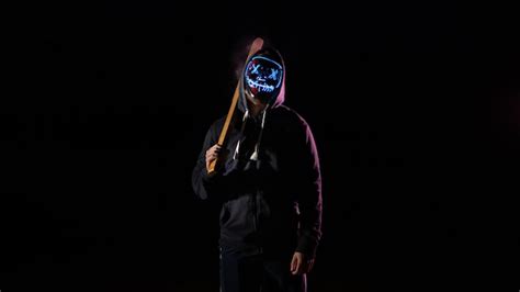 Premium Photo | Boy with lights mask from the purge