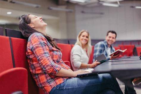 Free Photo | Girl laughing with friends in university