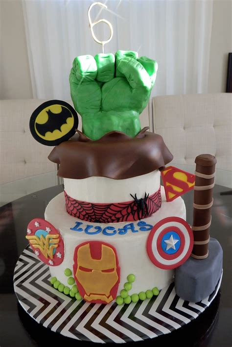 A Super Hero Cake Hulks Hand Is Made Of Modeling Chocolate The Rest Of The Details Are