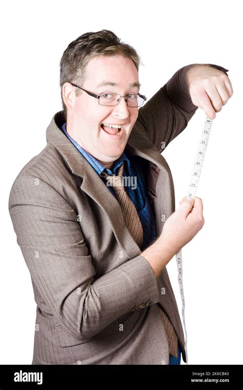 Cheerful Businessman Measuring The Length Of Business Success With Tape