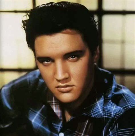 Elvis Presley Is Looking At The Camera