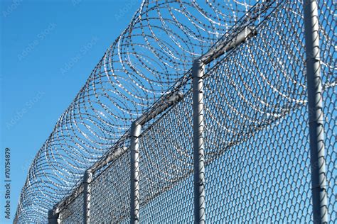 Prison fence Stock Photo | Adobe Stock