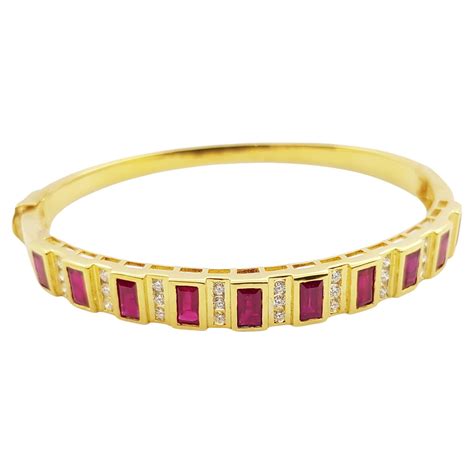 Blue Sapphire With Ruby And Diamond Panther Bangle Set In 18 Karat Gold