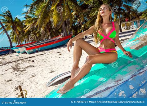 Blonde Girl On The Beach With Palms And Blue Sky Stock Photo Image Of Beautiful Attractive