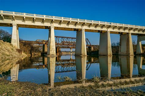 Samuel Ave Bridge And The Three Sisters Railroad Bridges Over West Fork