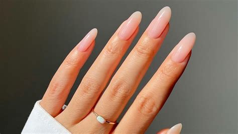 Naked Nails Are The Quiet Luxury Mani Trend Of Summer 2023 Glamour