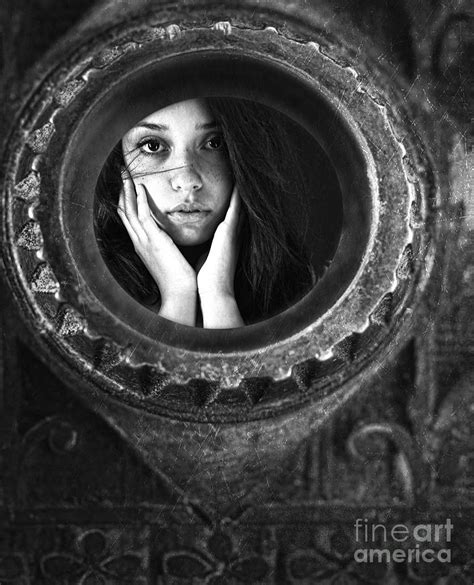 Young Woman Looking Unsure And Afraid Looking Through Peep Hole Photograph By Sandra Cunningham