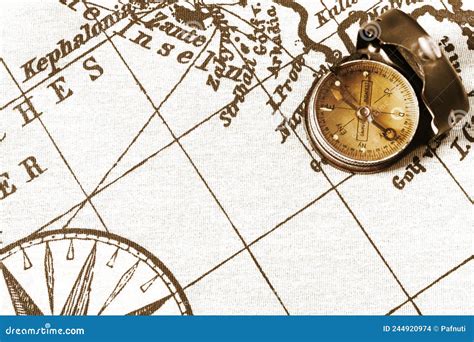 Magnetic Old Compass On World Vintage Map Travel Geography Navigation Tourism And Exploration