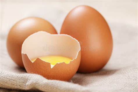 Raw Chicken Eggs One Open With Yolk Stock Photo Image Of Eggshell