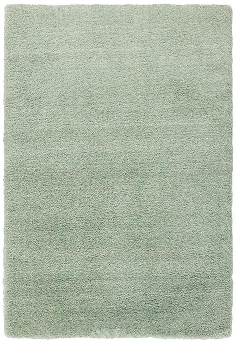 a light green rug on a white background