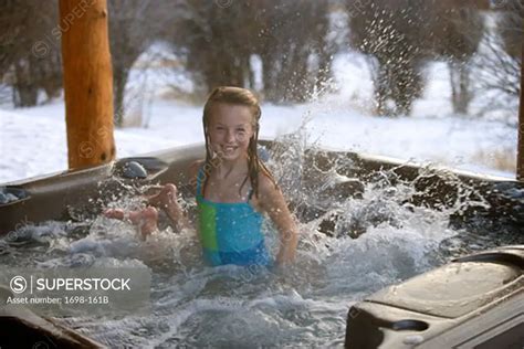 Girl In A Hot Tub With Her Brother Underwater Superstock