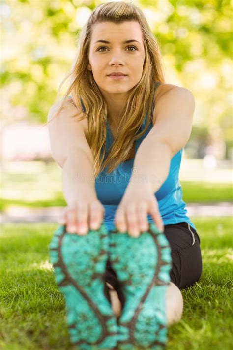 Fit Blonde Stretching On The Grass Stock Image Image Of Outdoors