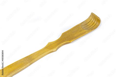 wooden backscratcher isolated on white background Stock Photo | Adobe Stock