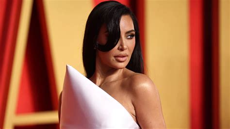 Kim Kardashian Paired Her Tiny Snakeskin Bikini With A Giant C