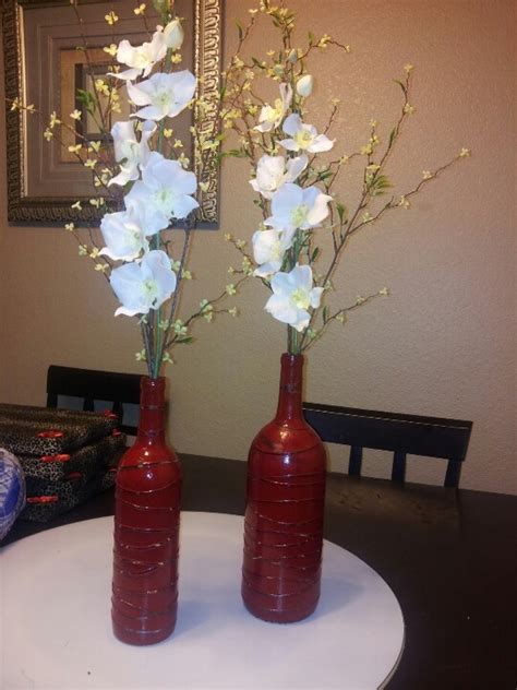 Wine Bottles Made Using Rubber Bands And Spray Paint Bottles