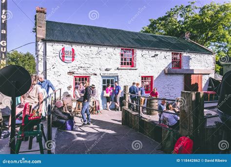 People Enjoying a Sunny Day in the Pubs in Dingle, Small Port Town on ...