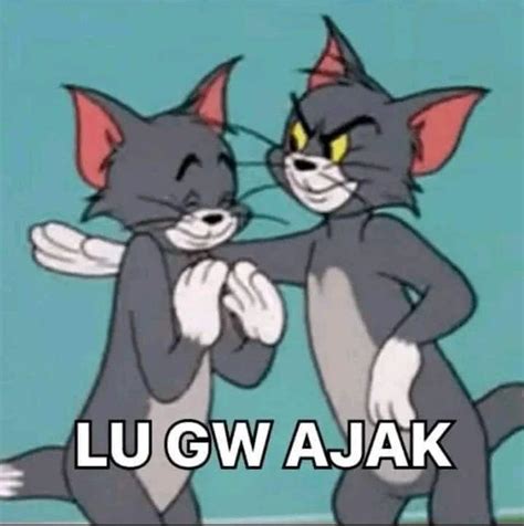 Two Cartoon Cats Standing Next To Each Other With The Caption Lu Gv Ajaxk