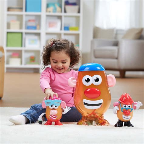 Download Mr. Potato Head swapping heads with a carrot | Wallpapers.com